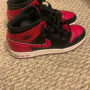 Black and Red Jordans ( Only wore once )